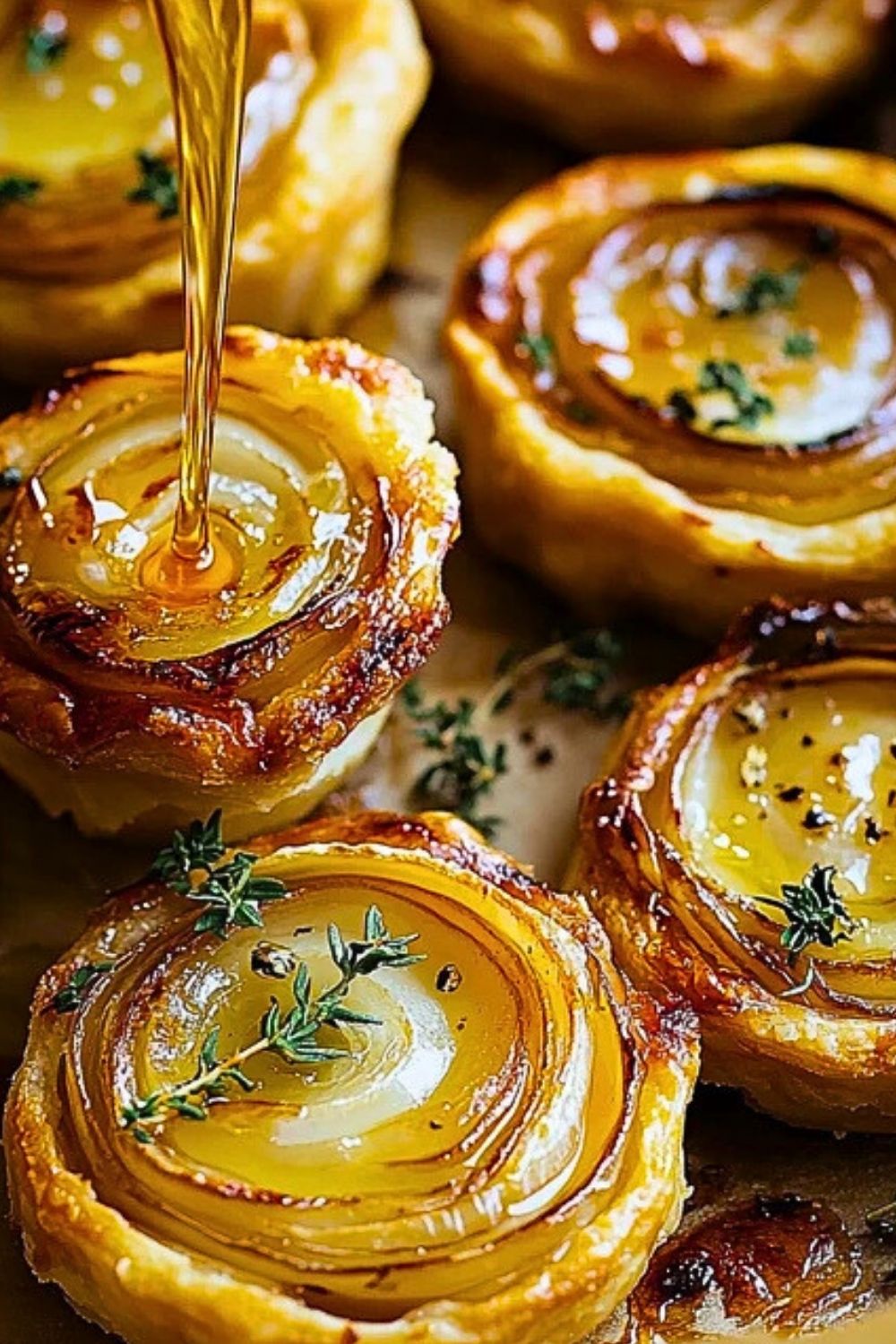 Upside-Down Onion and Gruyere Tarts with Hot Honey Drizzle