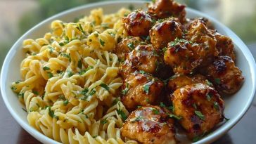 Delicious Garlic Butter Chicken Bites with Spicy Cajun Alfredo Twisted Pasta Recipe