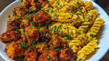 Chili Garlic Butter Chicken Bites with Creamy Cajun Corn Alfredo Twists