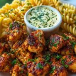 Lemon Cajun Chicken Bites with Creamy Garlic Herb Alfredo Twists 1