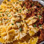 Cheesy Bowtie Pasta with Savory Cajun Ground Beef in Garlic Cream