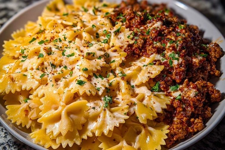 Cheesy Bowtie Pasta with Savory Cajun Ground Beef in Garlic Cream