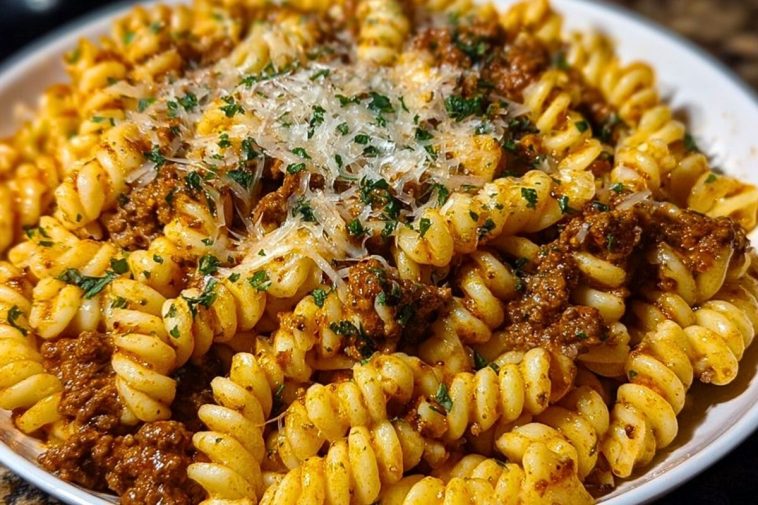 Cheesy Garlic Twisted Pasta with Cajun Ground Beef and Alfredo Velveeta