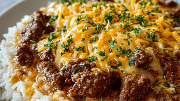 Garlic Butter Beef and Rice Skillet with Cheddar Parmesan Sauce